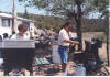 Susan Garcia and Kenny Perea ( cooking )