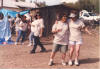 Virg and Nadine dancing near the fence, Marilyn looking at camera and Susan and Martha dancing in foreground