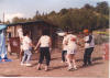 Family members dancing at family reunion